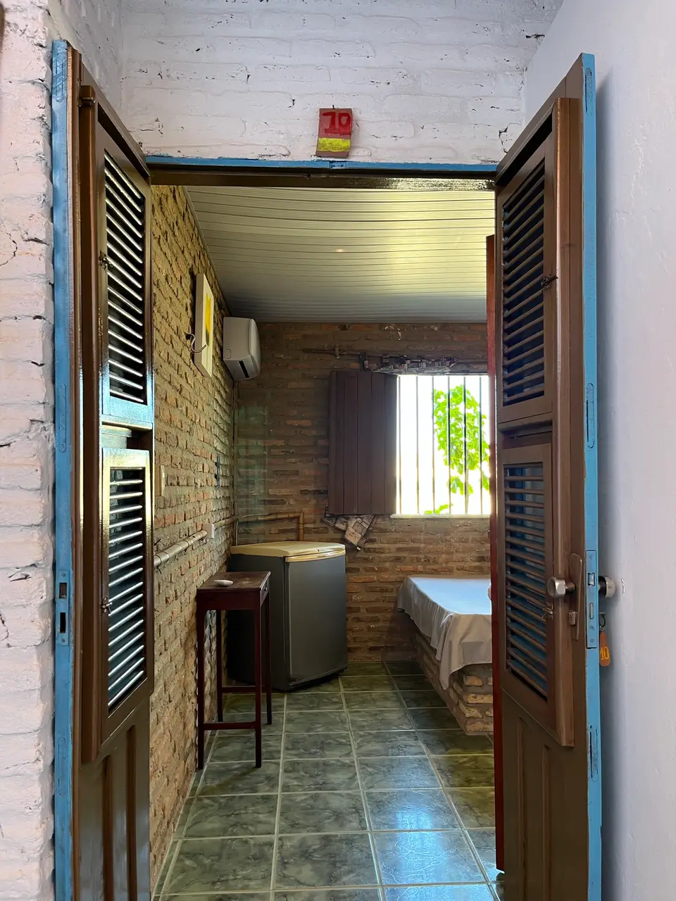 Quarto 10 — detalhe da suíte