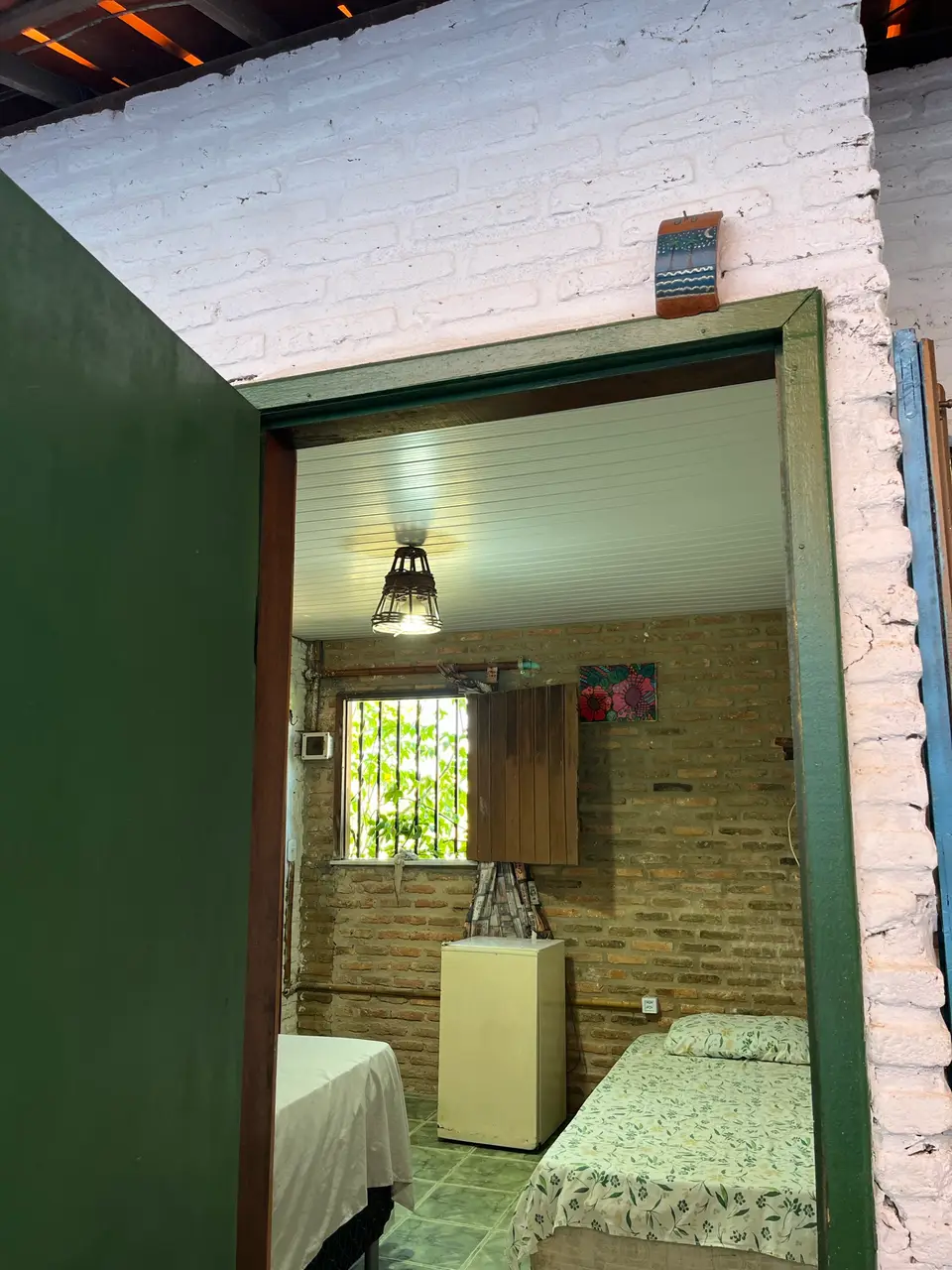 Quarto 11 — detalhe da suíte