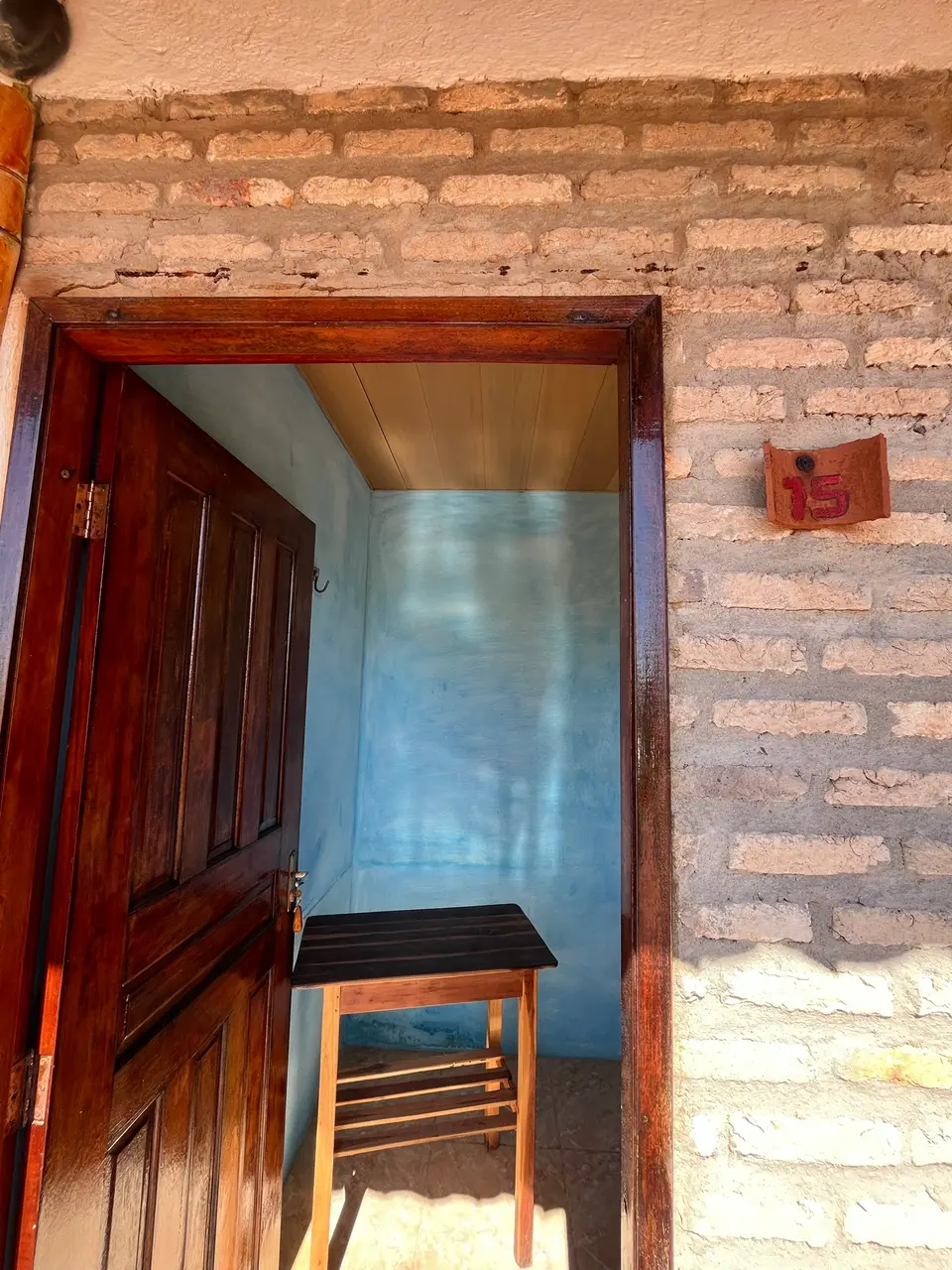 Quarto 15 — detalhe da suíte