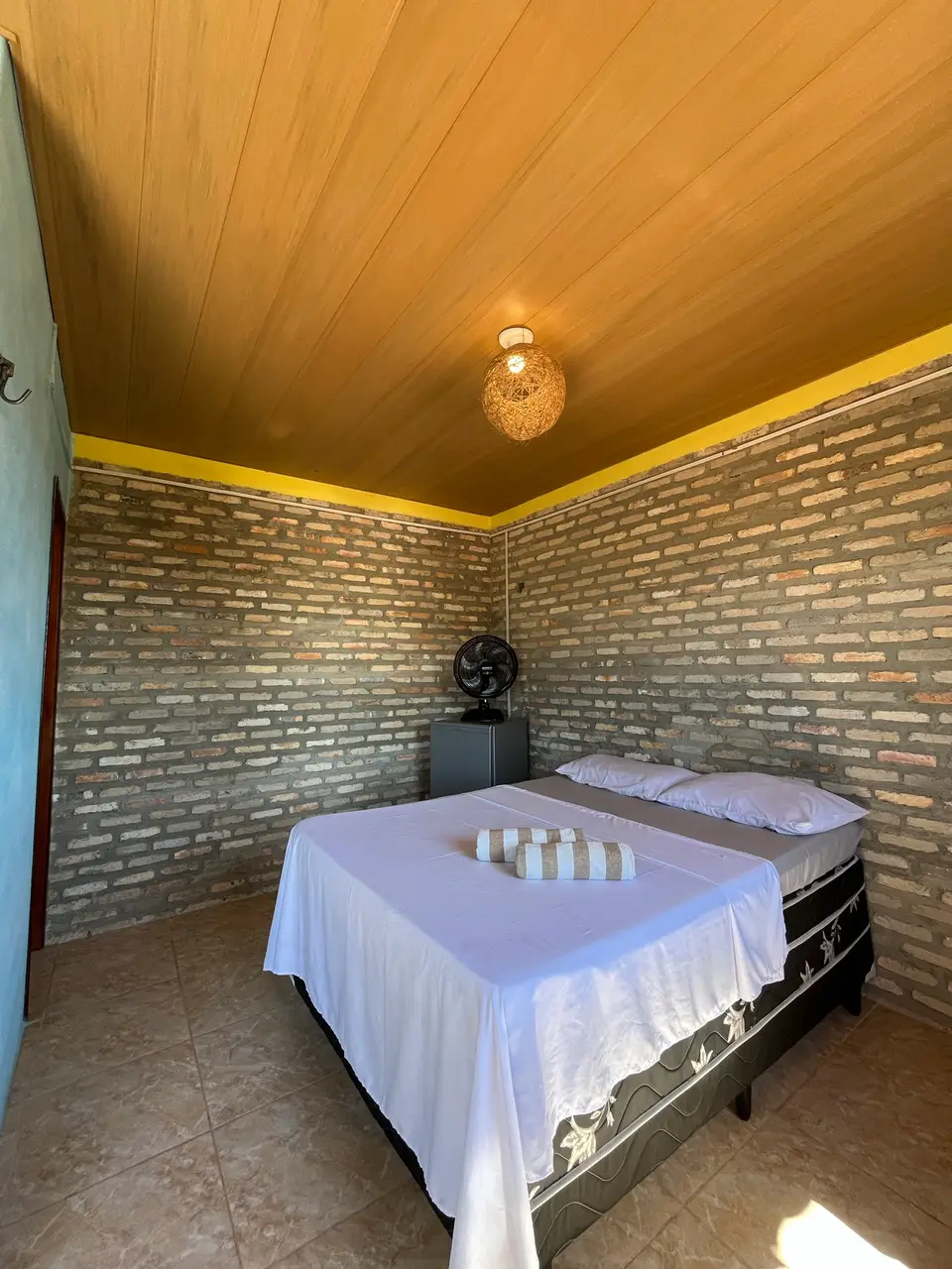 Quarto 15 — vista geral da suíte